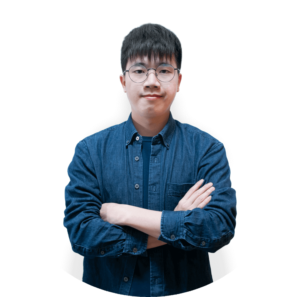 Portrait of Jiafa, a smiling product designer wearing glasses and an orange jacket